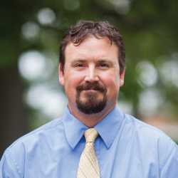 Dr. Christopher  Winslow 